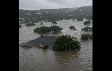 A house in shown under water after flooding near Boerne on July 16, 2026.