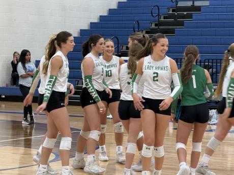 Wall's volleyball team laughs during the 2026 Nita Vannoy Memorial Tournament.