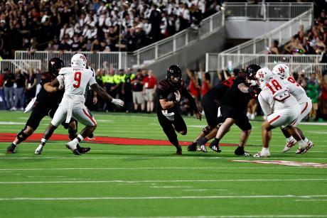 Texas Tech Red Raiders quarterback Will Hammond (15) rushes against the Houston Cougars in the second half at Galaxy Stadium in Lubbock on Sept. 18, 2026.