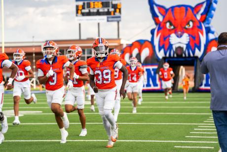 The Central Bobcats run onto the field before their game against Abilene Cooper on Friday, Sept. 11, 2026.