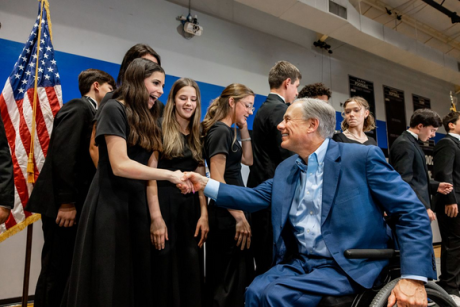 Governor Greg Abbott meets with students.