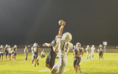 Branson Lacy bats down a 4th down pass intended for Rankin's Brinden Norwood