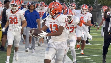 Central Bobcats' Gio Walker after an interception against Mansfield Lake Ridge