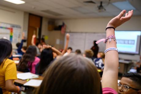A Nimitz Middle School student raises her hand during class on Sept. 13, 2023 in Odessa.