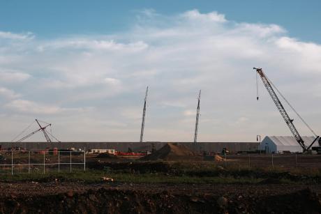 Cranes rise above one of the Google data center buildings under construction in south Haskell County on Aug. 19, 2026.