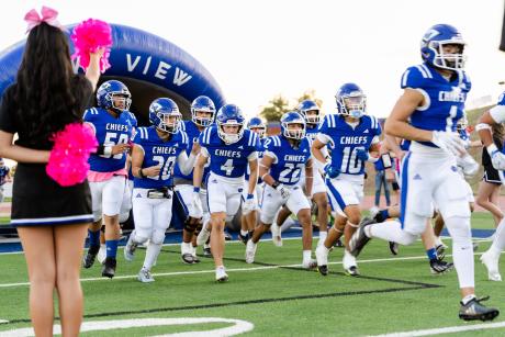 The Lake View Chiefs run onto the field before their game against Pflugerville Connally on Friday, Oct. 9, 2026.