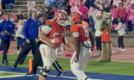 Central Bobcats' Zey Johnson and Parker Havercroft after a touchdown against Midland Lee, 2026.
