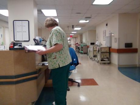 A nurse checks in at the nursing station on the 3rd floor (LIVE! photo by Cheyenne Benson)