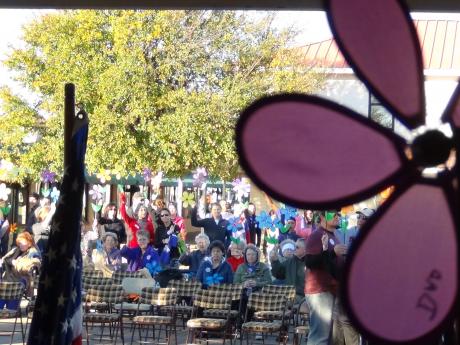 Flowers with the names of loved ones lost to Alzheimer's were carried by the walkers (LIVE! photo by Cheyenne Benson)