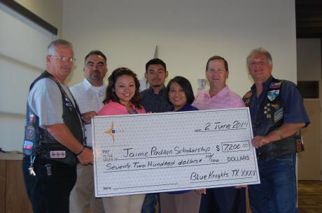 Presenting a check for $7,200 were (L-R): Brian Bylsma, Steve Diaz, Christina Diaz, Steven Diaz, Linda Diaz, Matt Lewis, and Greg Bishop. (LIVE! Photo/Joe Hyde)