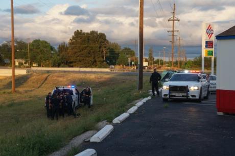 San Angelo police responded to a domestic violence call Easter Sunday and ended up chasing a suspect through the muddy field next to the Stripes on Knickerbocker. (LIVE! Photo/John Basquez)