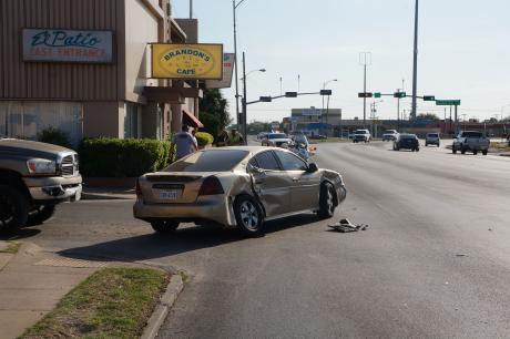 Grand Prix, Tahoe and Ram 2500 crash on W. Beauregard Ave on Apr. 25, 2014. (LIVE! Photo/John Basquez)