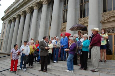 Those gathered at Fairmount Cemetery bow their heads for prayer on Tuesday at the Veterans Day Celebration. (LIVE! Photo by Chelsea Schmid)