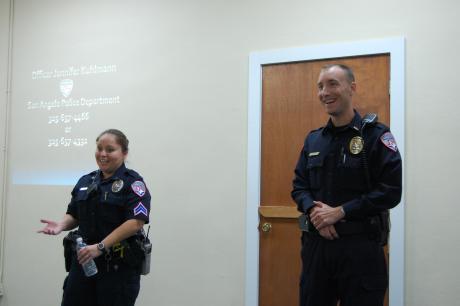 Jennifer Kuhlmann and a fellow officer answer questions at Thursday's crime prevention and identity theft meeting. (LIVE! Photo by Chelsea Schmid)