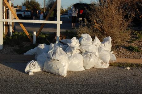 Cub Scout Pack 374 and their parents spent part of yesterday afternoon picking up litter behind Target. (LIVE! Photo/Matt Sage)