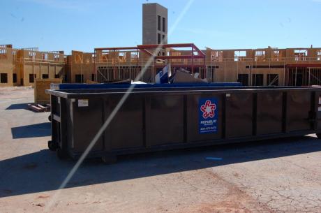 A Republic Services Roll-off Trash container at one of the new hotel construction sites at Houston-Harte and Sunset Dr. (LIVE! Photo/Joe Hyde)