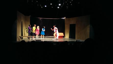 Linus (Ben Settle) tells the rest of the Peanuts gang why he loves his blanket so much at Angelo Civic Theatre. (LIVE! Photo by Chelsea Schmid)