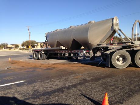 An early morning accident between a white Dodge Caravan and a Peterbilt Semi-truck on U.S. 67 N in from of South Plains Implement. (LIVE! Photo/Joe Hyde)