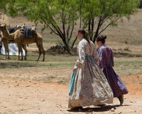 Women in period-accurate dress for the 1800s traverse the ground of Fort Chadbourne Saturday. (Contributed Photo/Amanda Berrie)