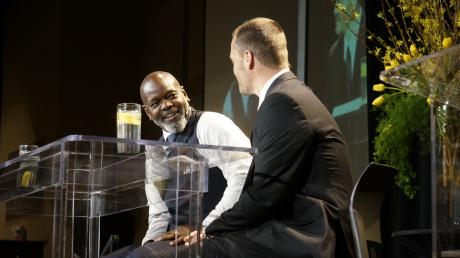 Emmitt Smith takes a seat next to ASU football coach Will Wagner. (LIVE! Photo/Chelsea Reinhard)