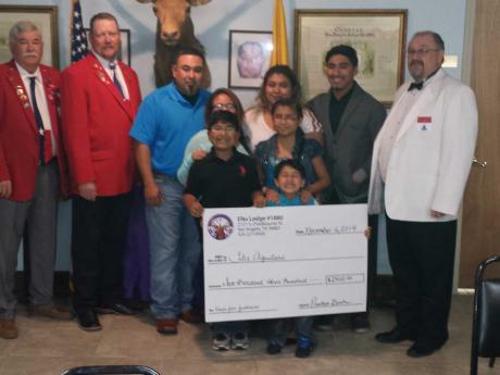 Elks Lodge #1880 presents a check to the family of Bianca Aguilar. (Contributed/Harry Thomas)