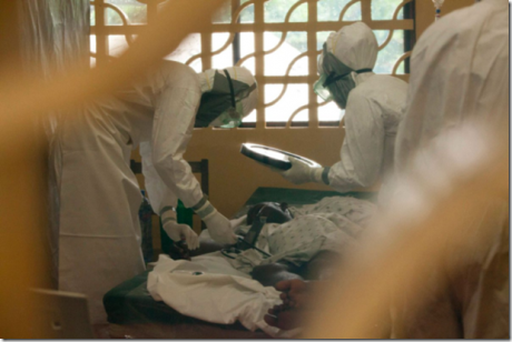 Suits, face masks and gloves were part of the daily attire in Monrovia, where Kent Brantly treated those infected with the Ebola virus. (Contributed Photo)