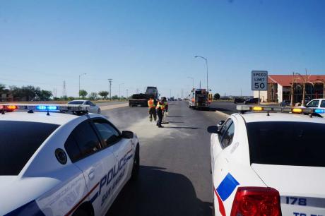 San Angelo Fire Dept. and police battle wet cement spills on S. Bryant. (LIVE! Photo/John Basquez)