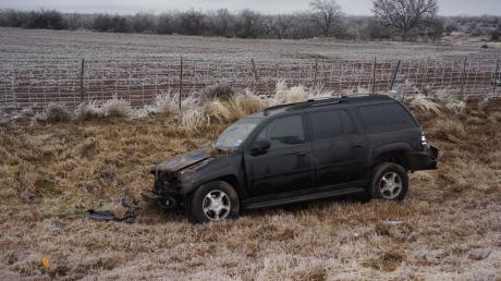 An SUV rollover crash on US 87 at 10 a.m. Jan. 2, 2015. (LIVE! Photo/John Basquez)