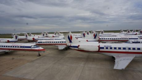 AMR Corporation is storing retired ERJ 140s at Mathis Field (LIVE! Photo/Joe Hyde)