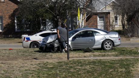 The passenger of the totaled Mitsubishi Eclipse attempts to find a ride after his friend was transported to Shannon. (LIVE! Photo/Joe Hyde)
