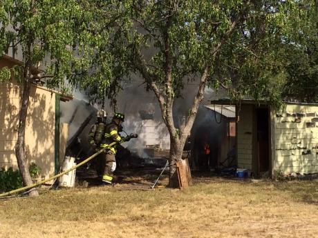Structure fire on the 1400 block of Spaulding Street on August 14, 2014. (LIVE! Photo/John Basquez)