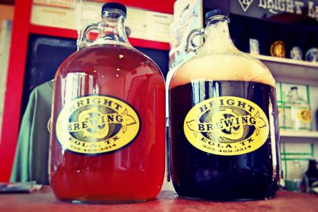 A couple of growlers for sale at the Eola School Brewery. (LIVE! Photo by Chelsea Schmid)