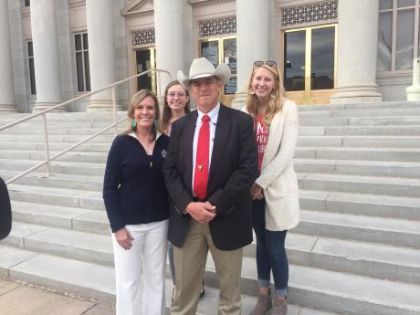 Nick Hanna (in hat) with his family