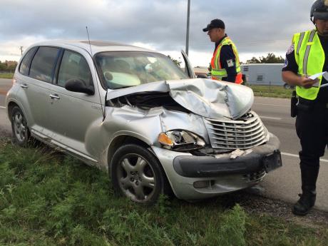 A PT Cruiser and Dodge flatbed pickup crashed this morning on Loop 306. Oct. 2, 2014. (LIVE! Photo/John Basquez)