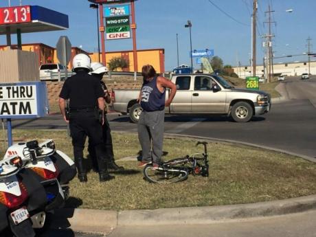 Cyclist escapes injury on 29th St. at Walmart Thursday.  Live photo Yantis Green 