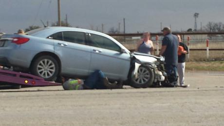 A blue Chrysler 300 crashed into a Ford F-250 on FM 2105 on March 18, 2015. (LIVE! Photo/Amanda Henson)