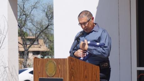 Sergeant Johnny Rodriguez ducks his head in emotional gratitude as he talks to those gathered at his retirement ceremony. (LIVE! Photo/John Basquez)