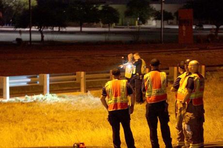 San Angelo police investigators on Loop 306 investigating the fatal motorcycle crash. (LIVE! Photo/John Basquez)