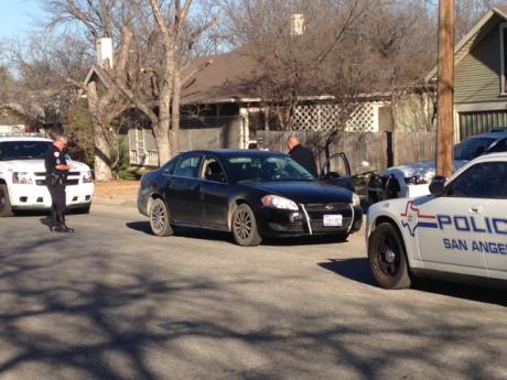 A black Chevrolet abandoned by the suspect who fled on foot. (LIVE! photo/John Basquez)