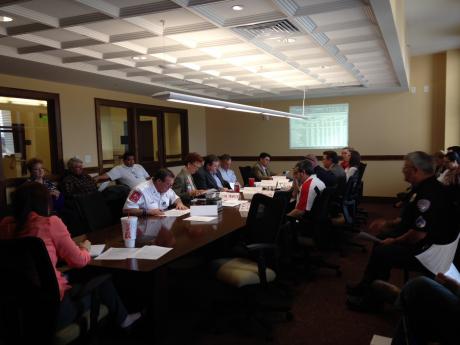 The Meet and Confer team looks over the minutes from a previous meeting. (LIVE! Photo/Chelsea Schmid)