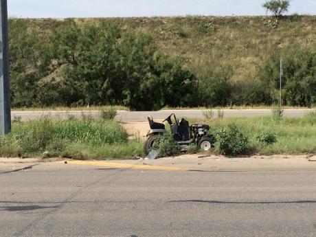 Lawnmower rollover on U.S. 87 (LIVE! Photo/John Basquez)