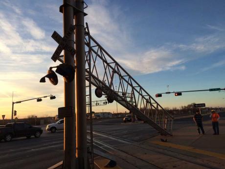 Railroad crossing lights were downed by an over-sized load on Jan. 15, 2015. (LIVE! Photo/John Basquez)