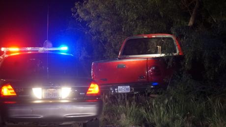 The red Ford pickup that was in the rollover crash. (LIVE! Photo/John Basquez)