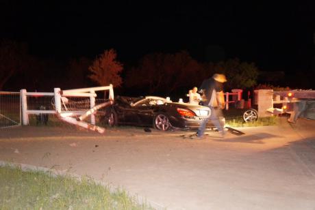 A Mercedes Convertible crashes into grand entrance in Butler Farms. (LIVE! Photo/John Basquez)