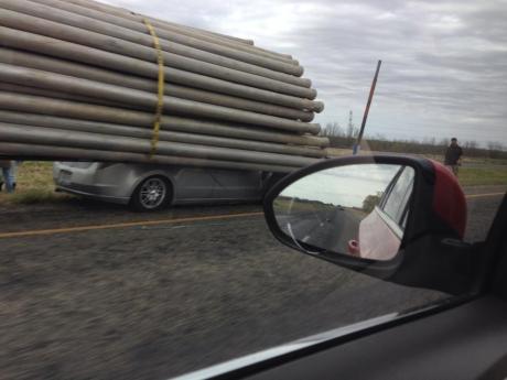 Car crushed by trailer of pipes on US 67 North (Contributed photo/Tristan Granzin)
