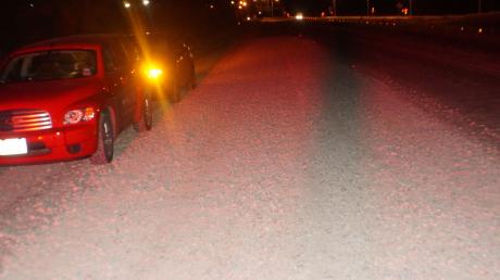 At first glance at night, it appears to be a gravel road. But this is a layer of gravel dropped here by a sandtruck on a paved access road to a freeway. (LIVE! Photo/John Basquez)