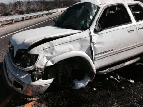Single vehicle accident on SH 208 near curve at South Red Creek, Mar. 20, 2014 (LIVE! Photo/Ed Blackburn)