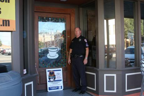 Community Services Liaison Officer Rick Tinsley waits for guests to arrive at the SAPD's Coffee With a Cop. (Photo courtesy of SAPD)