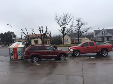 An SUV towing a U-Haul trailer crashed at the Stripes on S. Bryant near Denny's on Mar. 2, 2015. (LIVE! Photo/John Basquez)