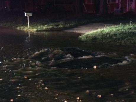 Water line break on Oxford Ave. in College Hills on Sept 21, 2014. (LIVE! Photo/John Basquez)